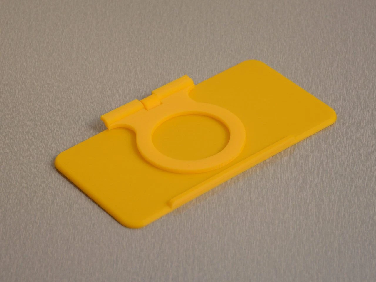 Soporte plegable para cargador de pared — miniatura
