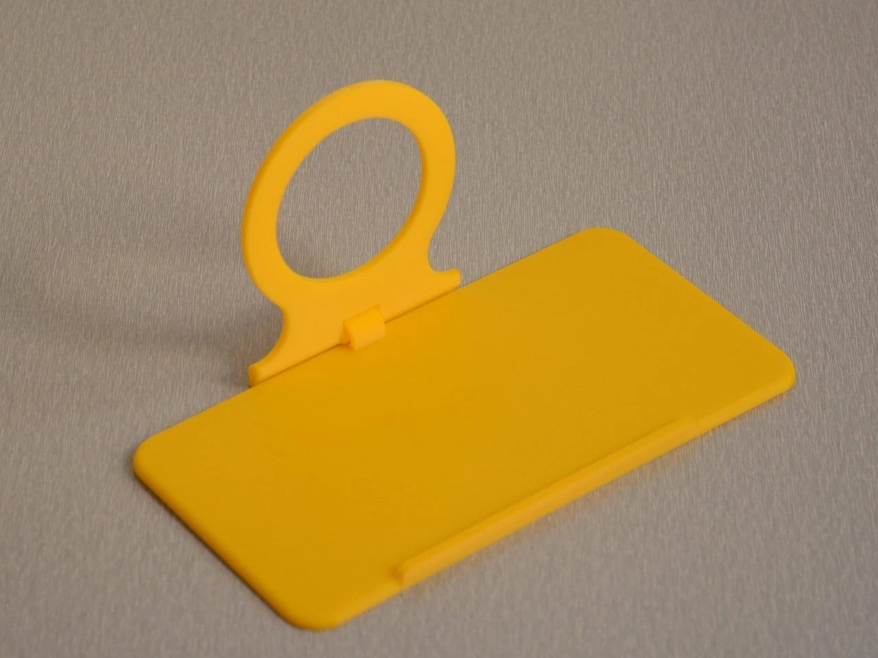 Soporte plegable para cargador de pared — miniatura